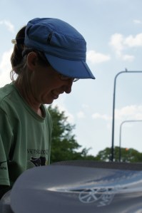 Andrea loads paddles and kayaks at Jackson Park after a debriefing Chicago Adventure Therapy staff about the day